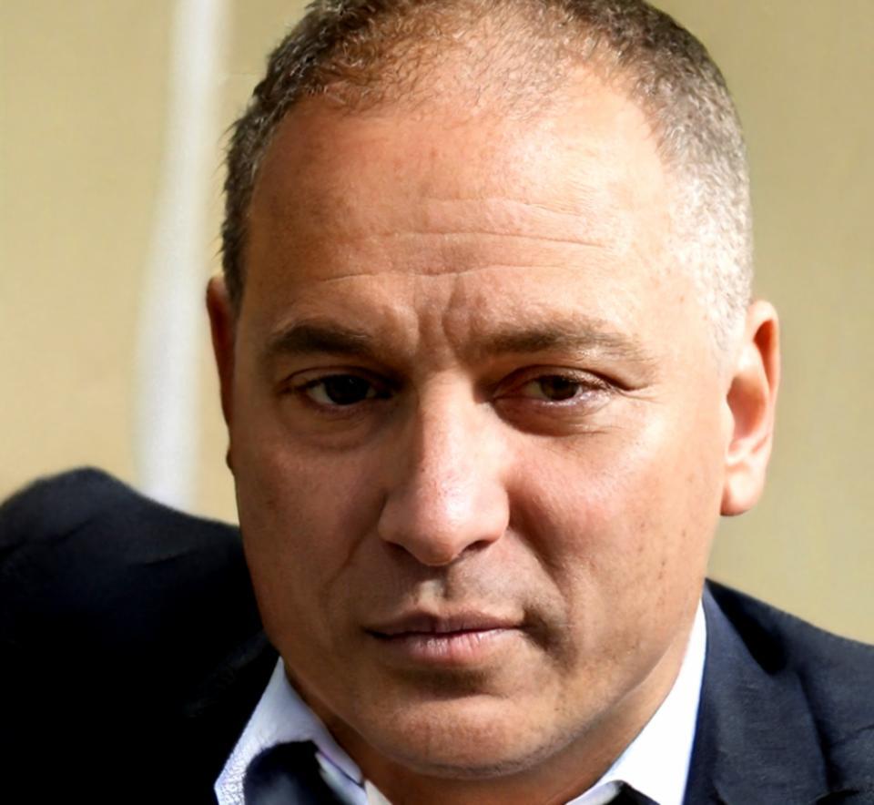 Dozent Henrik Feldmann während einer Beratung